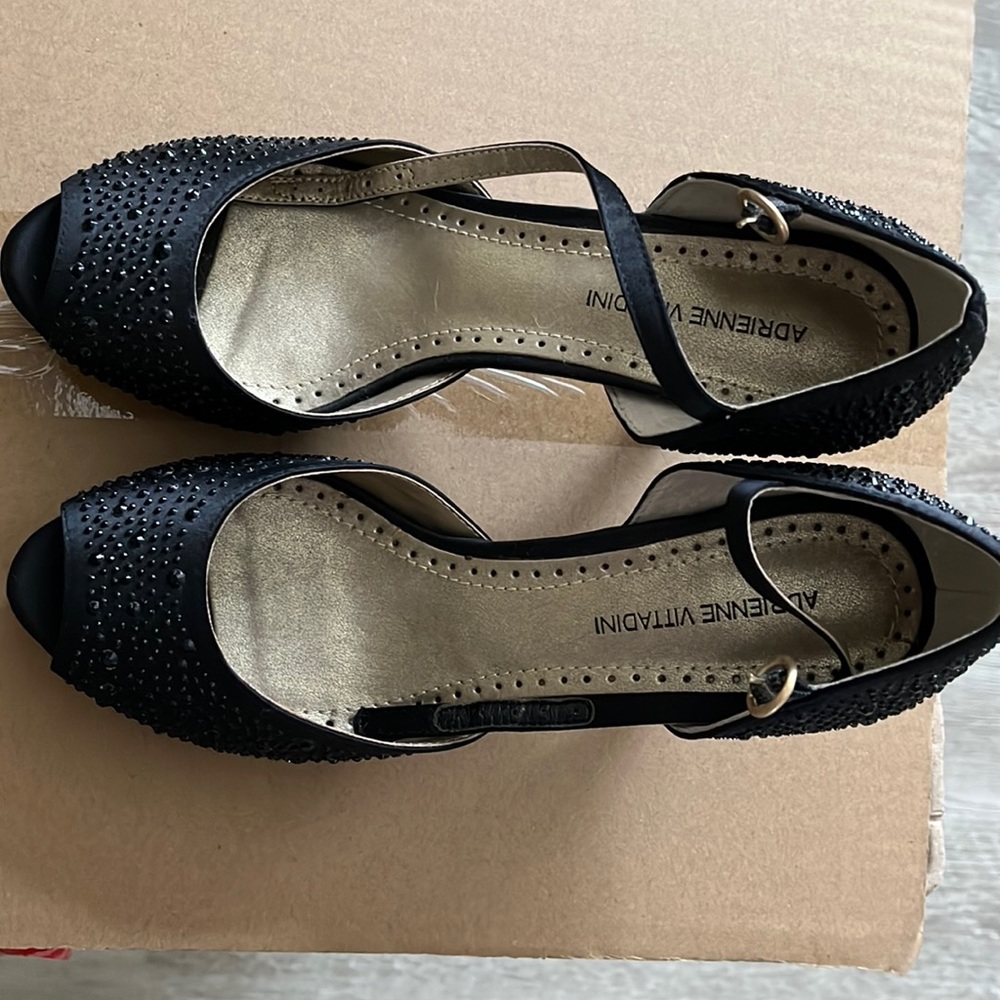 Black Dress heels , worn 1 time to a banquet .